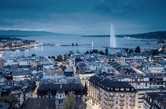 A landscape photograph of Geneva at night.