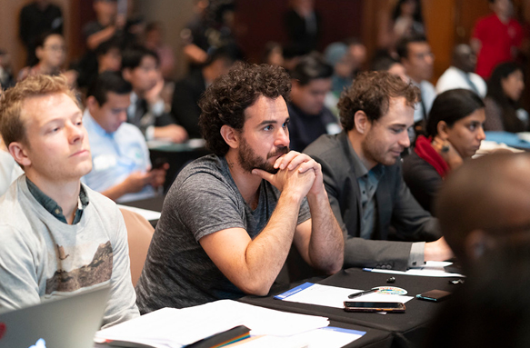 Several people listen to a talk at GYF.